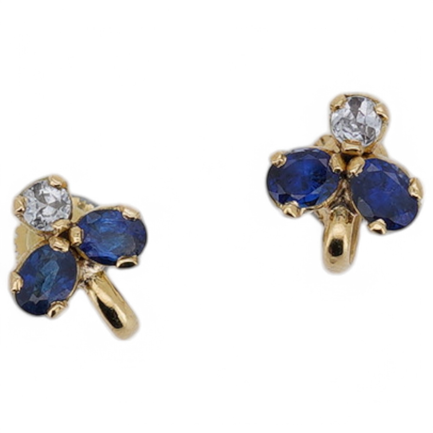 A modern pair of yellow metal and three stone blue and white sapphire cluster set ear clips, approx. 8mm, gross weight 3 grams. Condition - poor to fair